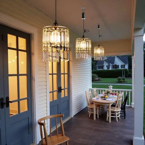 Battery Operated Chandelier With Acrylic Crystal Beads Waterproof Hanging Pendant Lights Dimmable Timer For Patio Decor Two Pack installed outdoors.