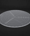 Top view of an 8-inch round center finder compass, transparent acrylic with concentric circles and radial scale markings