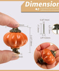 Orange Pumpkin Ceramic Cabinet Knobs Six Pack With Mounting Screws Vintage Drawer Pulls, hand-held showing dimensions.