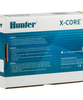 Box packaging for X Core XC400i Indoor Sprinkler Timer Four Zone Irrigation Controller with text descriptions in multiple languages