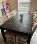 Dining table with Peel And Stick Black Wood Wallpaper Self Adhesive Contact Paper For Surfaces Easy To Clean Durable.