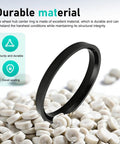 4 Pack Hub Centric Rings 66 6 To 57 1 Mm Plastic Adapters For All Cars And Trucks Black ring on plastic pieces background.
