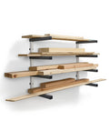 Heavy Duty Four Tier Lumber Storage Rack For Garage And Workshop Space Saving Metal Board Shelf For Plywood Pipes And Building Materials White Gray storing various lumber on wall.