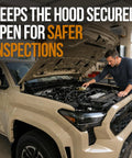 Heavy Duty Gas Hood Struts For Slick One Hand Lift Replacing Factory Prop Rod Rapid Under Hood Access For Toyota Tacoma 2024 To 2026 And 4Runner Models Badass Build No Sweat in a garage with a man inspecting the engine.