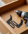 Rock Solid 2 Piece Adjustable Bench Grinder Tool Rest Bracket For Multiple Angles, heavy duty steel tool rests beside a drill.