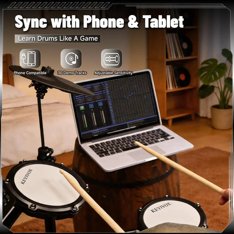 Silent Electronic Drum Set For Adults And Beginners Complete Mesh Pad Kit With USB MIDI connected to laptop in living room.