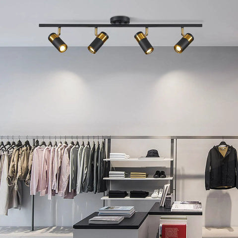 4 Lights Matte Black Track Lighting Fixture For Ceiling above clothing display in modern retail store, adjustable heads, aluminum build