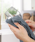 Hands cleaning a glass with gray towel, Pack Of 60 14 By 17 Inch Bar Towels For Cleaning 100 Percent Cotton Absorbent And Reusable Multipurpose Terry Cloth Shop Rags Gray Great For Heavy Duty Cleaning Spills And Damp Surfaces In Home Garage And Workshop