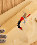 Pro Grade Angle Grinder Coolant Sprayer System Featuring Badass Stainless Steel Mist Nozzle for dust-free cutting on wooden surface.