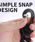 Close-up of hand using Two Pack Scuba Hose Clips For Dope Dive Gear, dual hose holder snap mechanism, black hook detail.