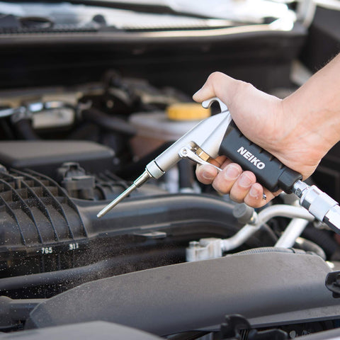 Hand holding High Flow Air Blow Gun With Three Piece Pneumatic Nozzle Kit For Dust Debris And Wet Spills, Pro Grade Shop Essential For Any Air Compressor.