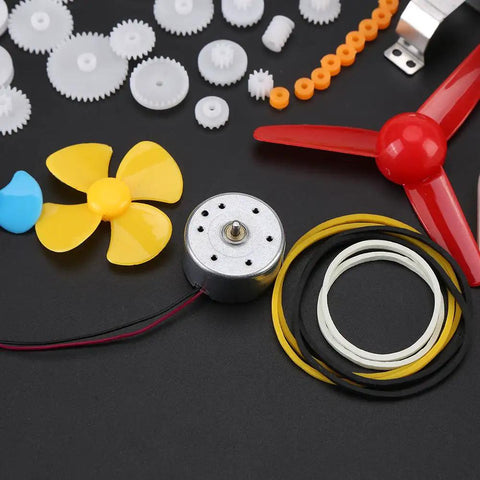 Plastic Crown Gear Set For DIY Robots And Toys, Motor Gear Kit with pulleys, plastic gears, belts, and motor on black background