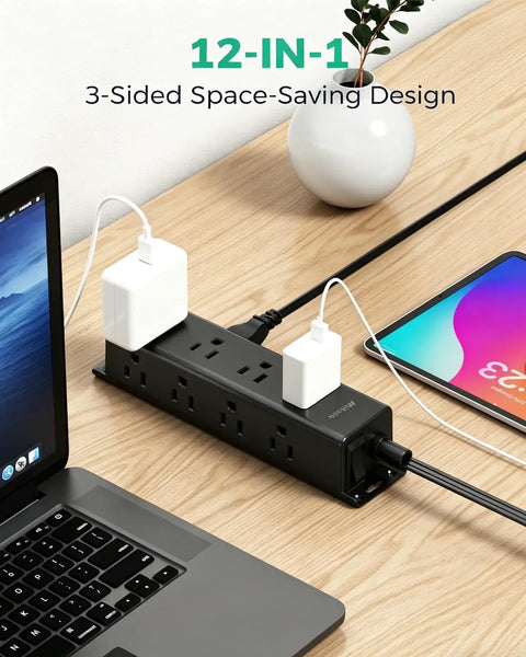 Heavy Hitter 12 Outlet Surge Protector Power Strip With Super Roomy Layout For Zero Plug Tangles, Floor Or Wall Mount, 5 Foot Cord, 900 Joule Shield, Simple Reset Switch on wooden desk with laptop and multiple chargers.