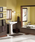 Bathroom featuring the Brantford 24-Inch Towel Bar In Oil Rubbed Bronze ORB, coordinating with classic decor and fixtures.