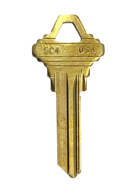 SC4 BR Brass Key Blank For SCH C 6 Pin Keyway, single brass key shown upright showing cut ridges and branding.