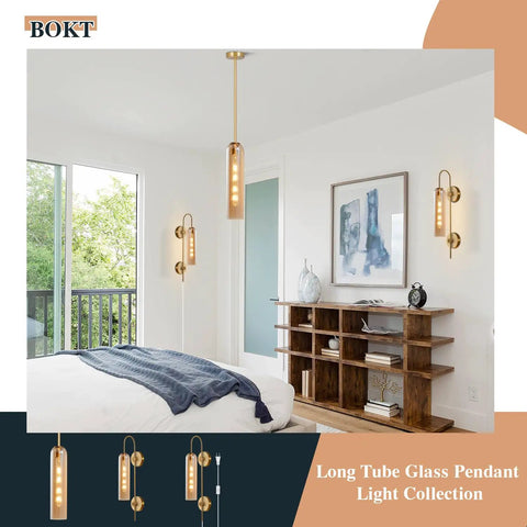 Amber Glass Wall Sconce With Brass Tube, 1 Light Modern Mid Century Vanity Fixture illuminating a bedroom.
