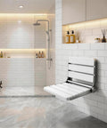 16 Inch Foldable Shower Seat Wall Mounted For Adults With 400 Lb Max Load Easy Drop Down Design Heavy Duty Waterproof Wood And Stainless Steel Build No Fuss Fits Small Inside Shower Spaces White installed in modern shower.