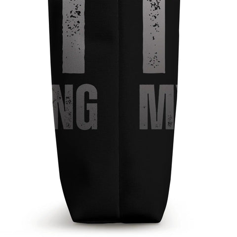 Side view of Yo Wingfoil Crew, I Cant My Foil Is Calling Wing Foil Wingsurfing Tote Bag, showing black poly canvas material