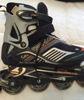 Side view of Spirit Blade Xt Inline Skates for Men Size 12 Black and Orange with comfort fit, durable wheels, and sturdy boot