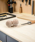 2-Piece Solid Wood Table Leg Set With 3-Inch Unfinished Bun Feet for Sofa, Cabinet, or Bookcase on a woodworking table