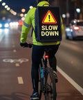 21.5 Inch Walking Backpack Digital Billboard Featuring 1080p Full Hd Ips Screen And 400 Nits Brightness For Indoor Signs That Are Straight Up Game Changers worn by cyclist at night.