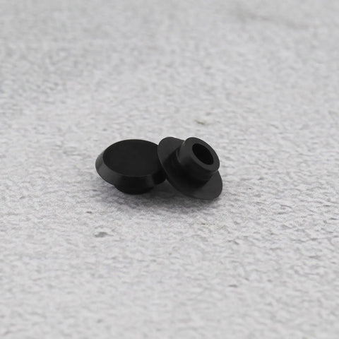 50 Pack Socket Head Screw Cover Caps For M6 Allen Screws, Black Hex Head Plastic Protectors on gray surface