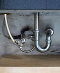 2 Pack Solid Brass Straight Stop Valves Quick Connect Shut Off Fittings 1/2 Inch PTC To 3/8 Inch Compression Output installed under kitchen sink
