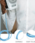 Person holding a PTFE high temperature steam hose for steam irons; durable and easy-connect high pressure tube for ironing.
