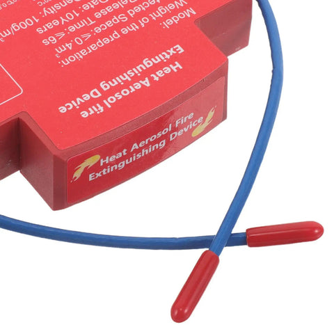 Hella Smooth Automatic Fire Extinguisher Aerosol Spray Sticker With Rock Solid Back Adhesive For Vehicle Engine Bay and Home Garage Safety Boss Level Heat Resistant Flame Retardant Protection 10g Capacity, red device with blue safety wires.