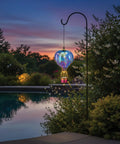 Hot Air Balloon Solar Lantern With LED Lights Hanging Outdoor Lamp Waterproof And Portable For Garden Patio and Pathway by poolside at sunset