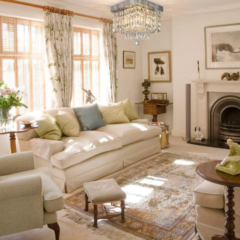 Dope Modern Square Raindrop Crystal Chandelier Flush Mount Ceiling Light Fixture in elegant living room with sofas and fireplace.