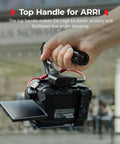 Person holding Camera Cage For Canon R50V Full Cage With Silicone Grip And Top Handle For ARRI HDMI Cable Clamp setup