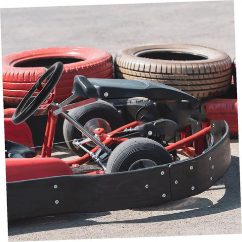 Universal 14 Inch Red PU Steering Wheel With Horn Button in go-kart, showing aluminum alloy rim and red grip for control.