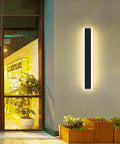 Four Direction Black Acrylic Outdoor Wall Light With 3000K Warm Glow, IP65 waterproof exterior porch sconce on modern house wall.