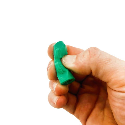 Hand squeezing a green Spear Shaft Tip Protector Soft Safety Cap For 7 To 8 Mm Spear Shafts And 9/32 To 5/16 Inch Tips Anti Stab Cover