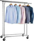 Metal clothing rack with four shirts and a denim jacket hanging, includes Four Inch Brake Stem Casters With Lock Nuts Swivel Rubber Wheels.