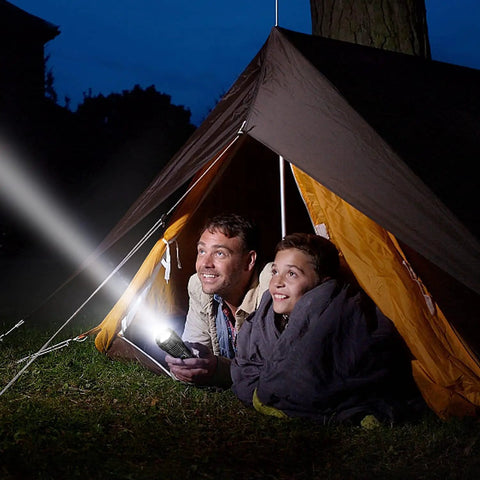 Father and child in tent using Rechargeable LED Flashlight With Up To 90 000 Lumens Be A Beast Bright XHP70 2 Tactical Light