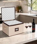 Heavy Duty Wine Glass Storage Box Two Pack With Thick Padded Dividers Secure Hardshell Case for Stemware and Champagne Flutes on kitchen counter.