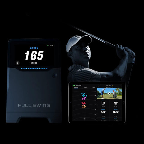 Portable Golf Launch Monitor And Simulator With 5D AI Radar, 4K Camera And OLED Display next to golfer and digital screen