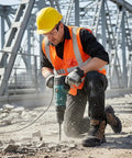 Worker wearing Steel Toe Work Boots For Men Safety Non Slip Puncture Resistant Comfort With Kevlar Midsole for industrial work
