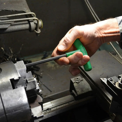 Using the Eight Piece Star T Handle Set With Graduated Lengths T9 Through T40 on a lathe, highlighting ergonomic grip and welded blade.