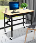 Heavy Duty Rolling Workbench Adjustable Height Rock Solid Steel Base Durable Hardwood Top Smooth Glide Casters Tool Cart For Garage Workshop Home Flex Setup with computer and plant.
