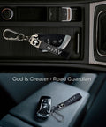 Legit Faith Driven Christian Cross Leather Keychain For Men, Heavy Duty Faux Leather Key Ring on car console with keys.