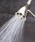 S-2252-PN-E2 Signature Brass Icon Anystream Shower Head with 360 Degree Spray in action, polished nickel, 6 jets visible