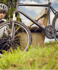 Cyclist with mountain bike featuring Beefed Up Heavy Duty 170mm 52T Square Taper Crankset With Double Chain Guard.