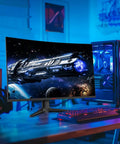 Massive 32 Inch Curved Qhd Gaming Monitor Serving Crisp 1440p Detail With A Smoking 170Hz Refresh Rate and Snappy 1Ms Response in a gaming setup.