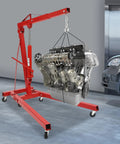 Heavy Duty Foldable Shop Crane Engine Hoist Rolling Cherry Picker With 4409 Lb Capacity lifting an engine in a garage.