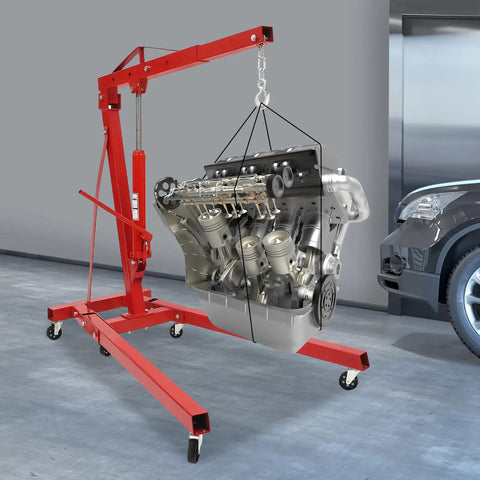 Heavy Duty Foldable Shop Crane Engine Hoist Rolling Cherry Picker With 4409 Lb Capacity lifting an engine in a garage.