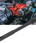 Heavy Duty Pump Drive Pin Fits 283 302 327 350 And 5.7L Small Block Engines With Black Metal Build positioned near engine.