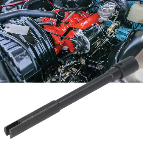 Heavy Duty Pump Drive Pin Fits 283 302 327 350 And 5.7L Small Block Engines With Black Metal Build positioned near engine.